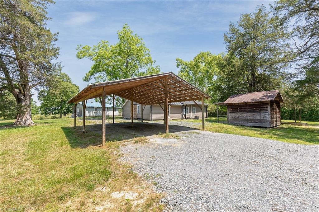 5084 Lewis Brown Road Bennett, NC 27208 - Photo 15 of 17 Carport