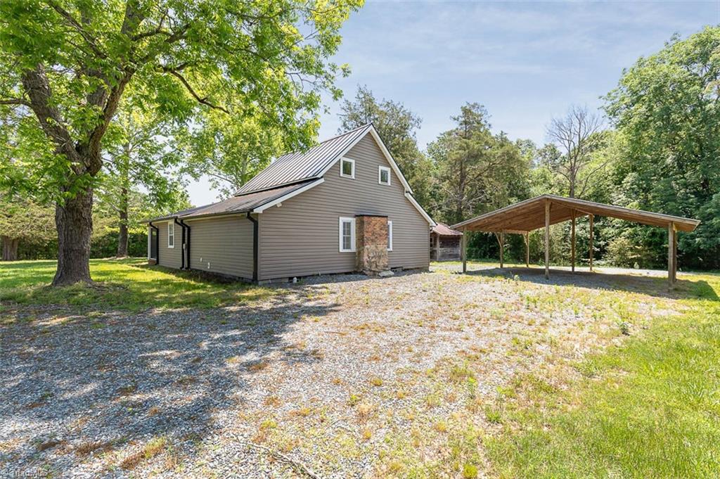 5084 Lewis Brown Road Bennett, NC 27208 - Photo 16 of 17 Exterior Rear