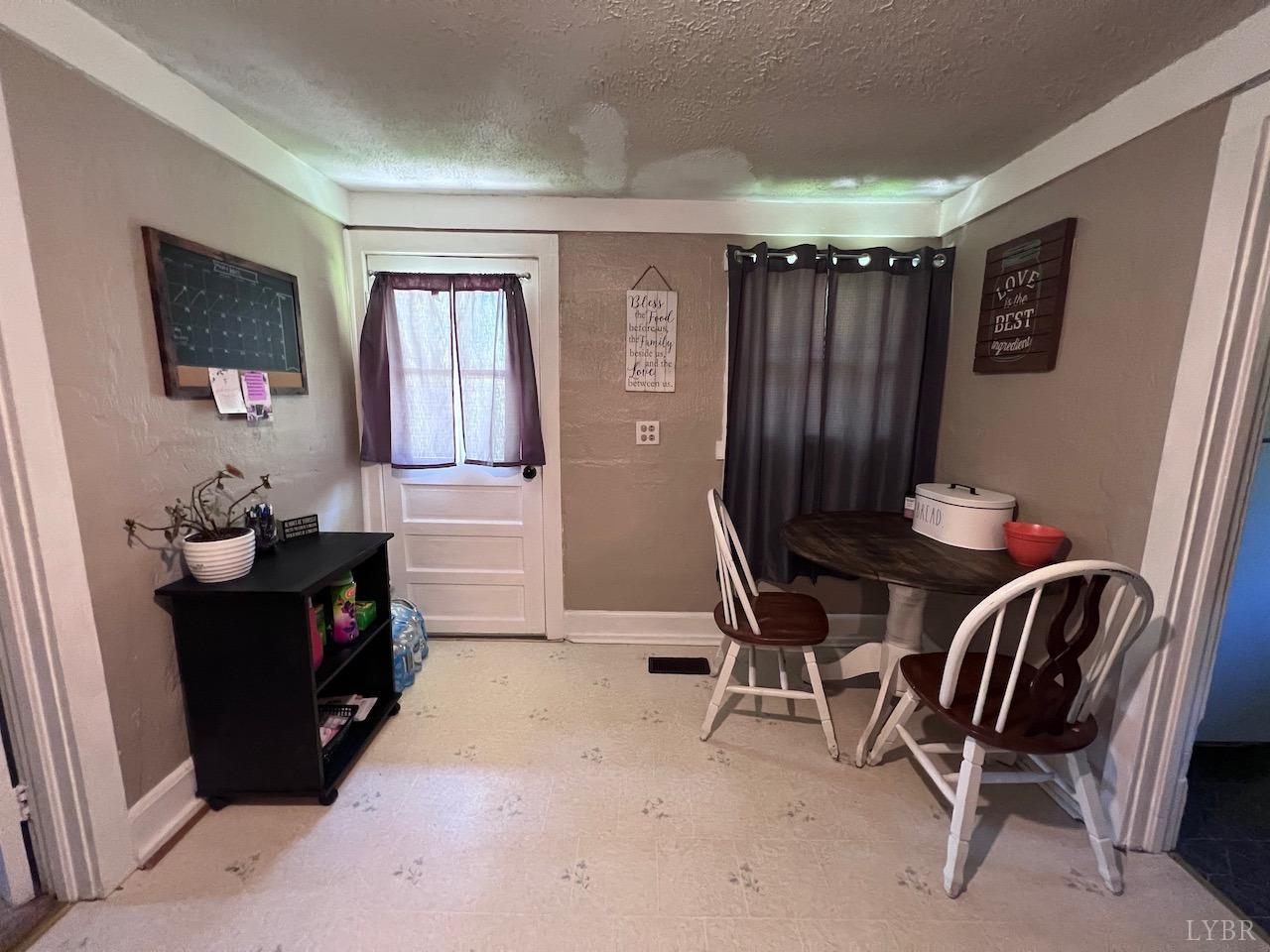 6238 Laurel Road Shipman, VA 22971 - Photo 4 of 11 a view of a workspace with furniture and a window
