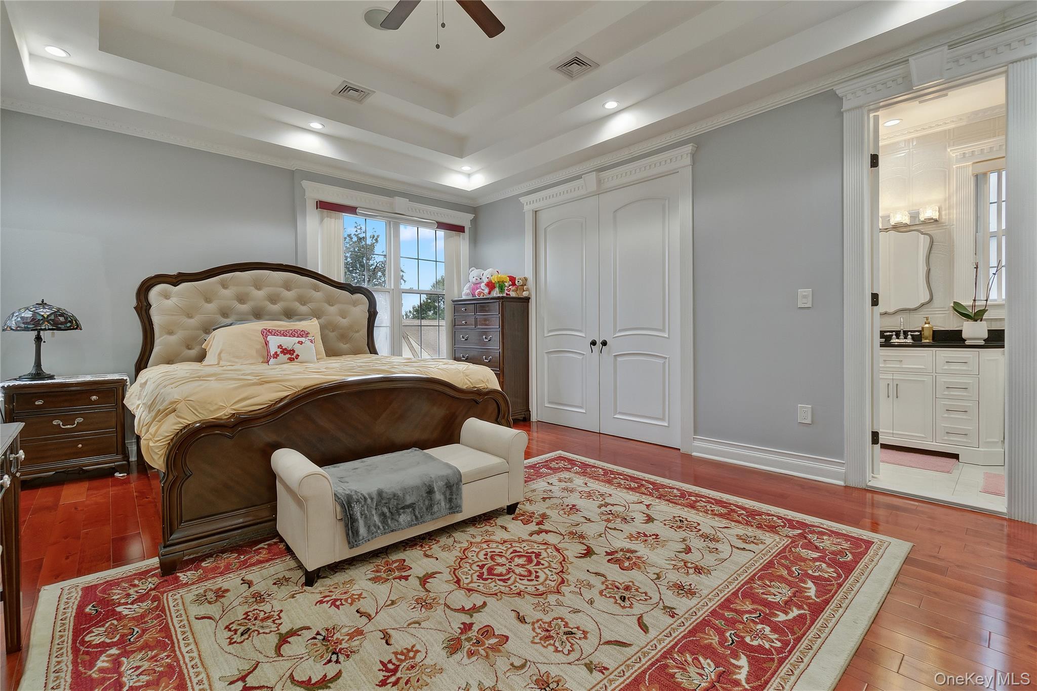 193-19 109th Road Queens, NY 11412 - Photo 16 of 27 a bedroom with a bed and wooden floor