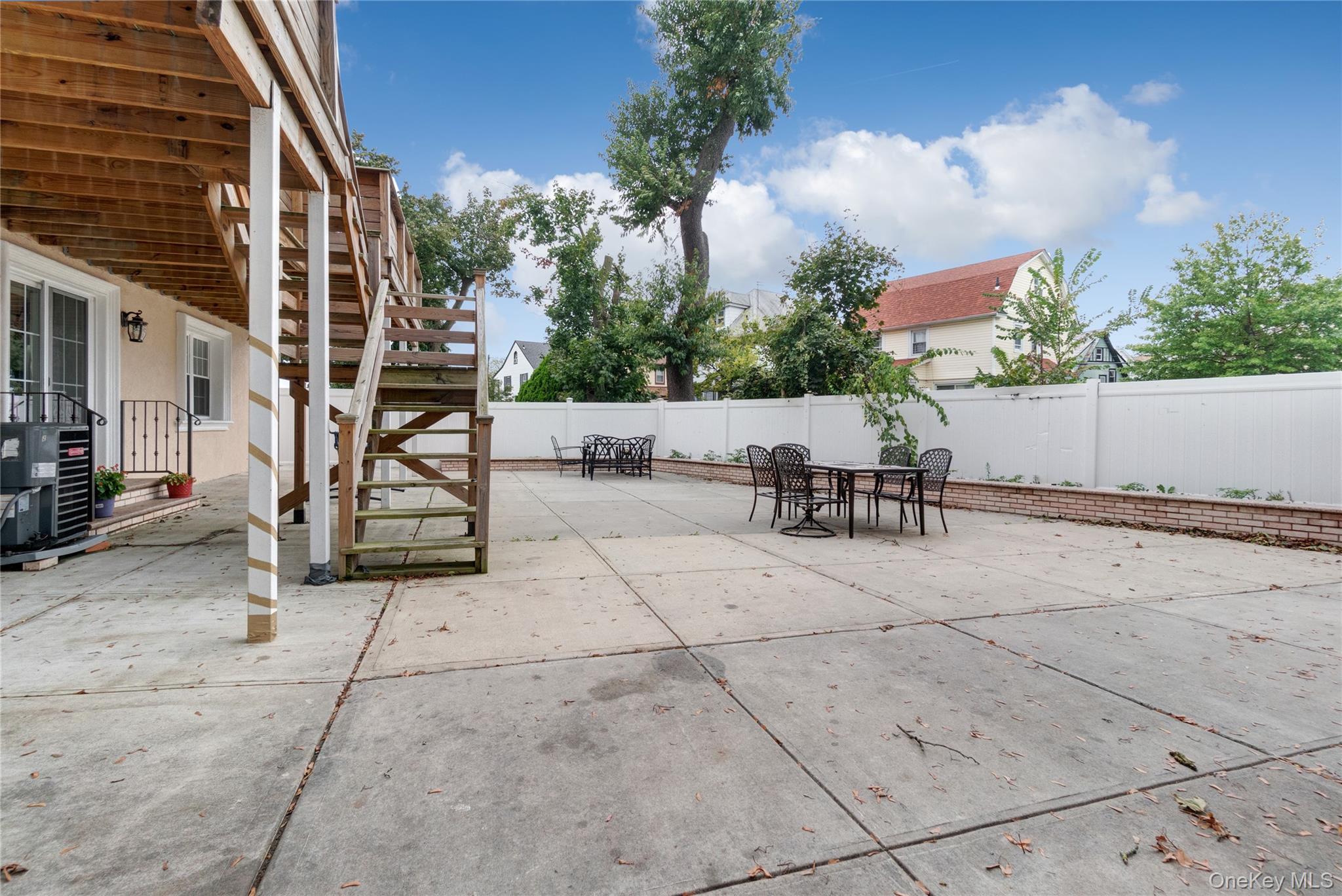 193-19 109th Road Queens, NY 11412 - Photo 26 of 27 a view of outdoor space with seating area