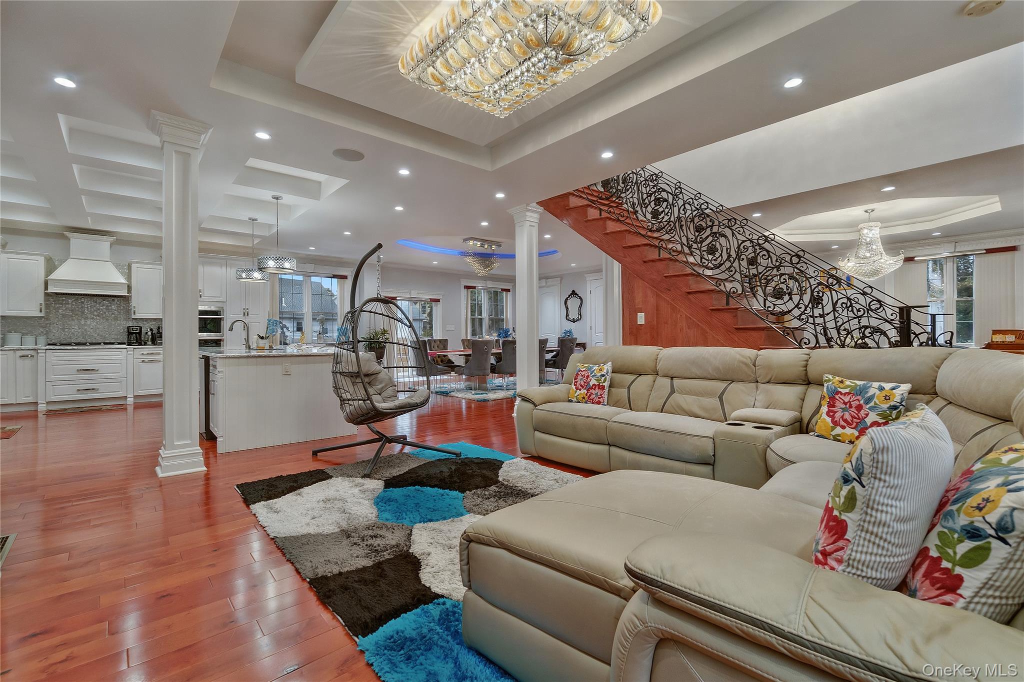 193-19 109th Road Queens, NY 11412 - Photo 10 of 27 a living room with furniture and kitchen view