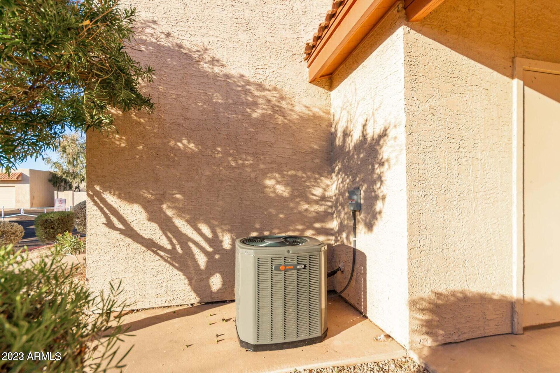 1440 North Idaho Road, Unit 1036 Apache Junction, AZ 85119 - Photo 10 of 13 a view of tall trees