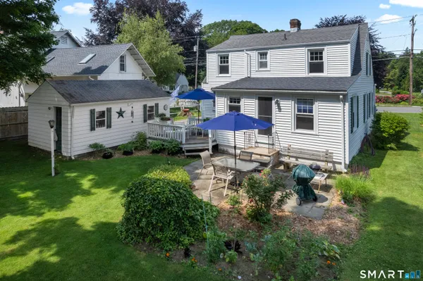 an aerial view of a house with a garden
