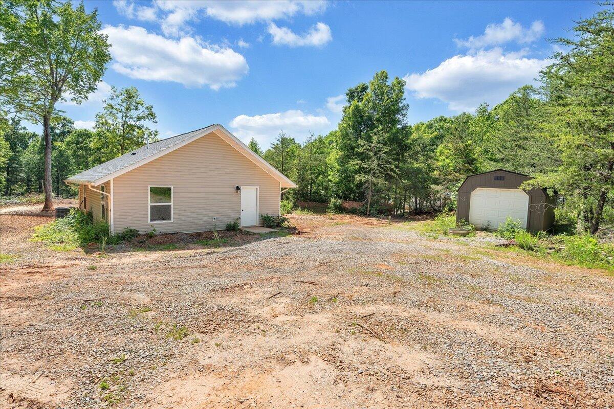 6379 Fork Mountain Road Rocky Mount, VA 24151 - Photo 2 of 9 a view of a outdoor space with a house