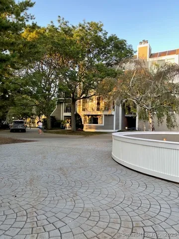 a view of a car park in front of a building