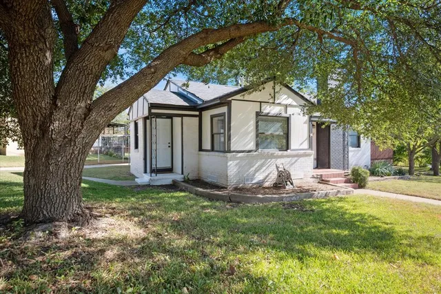 a house view with a garden space