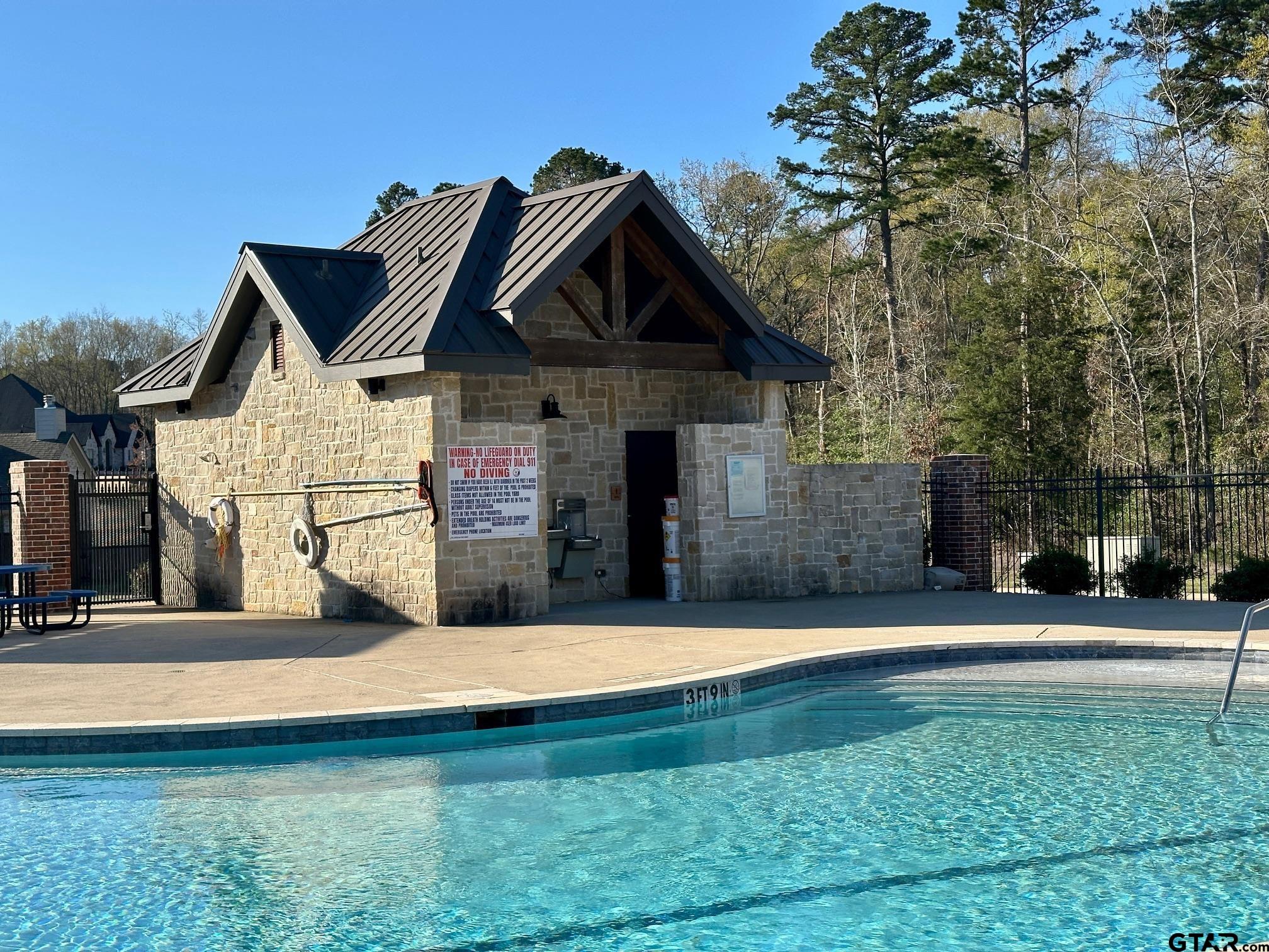 9291 Caddo Rdg Cove Tyler, TX 75703 - Photo 11 of 13 a front view of a house with yard