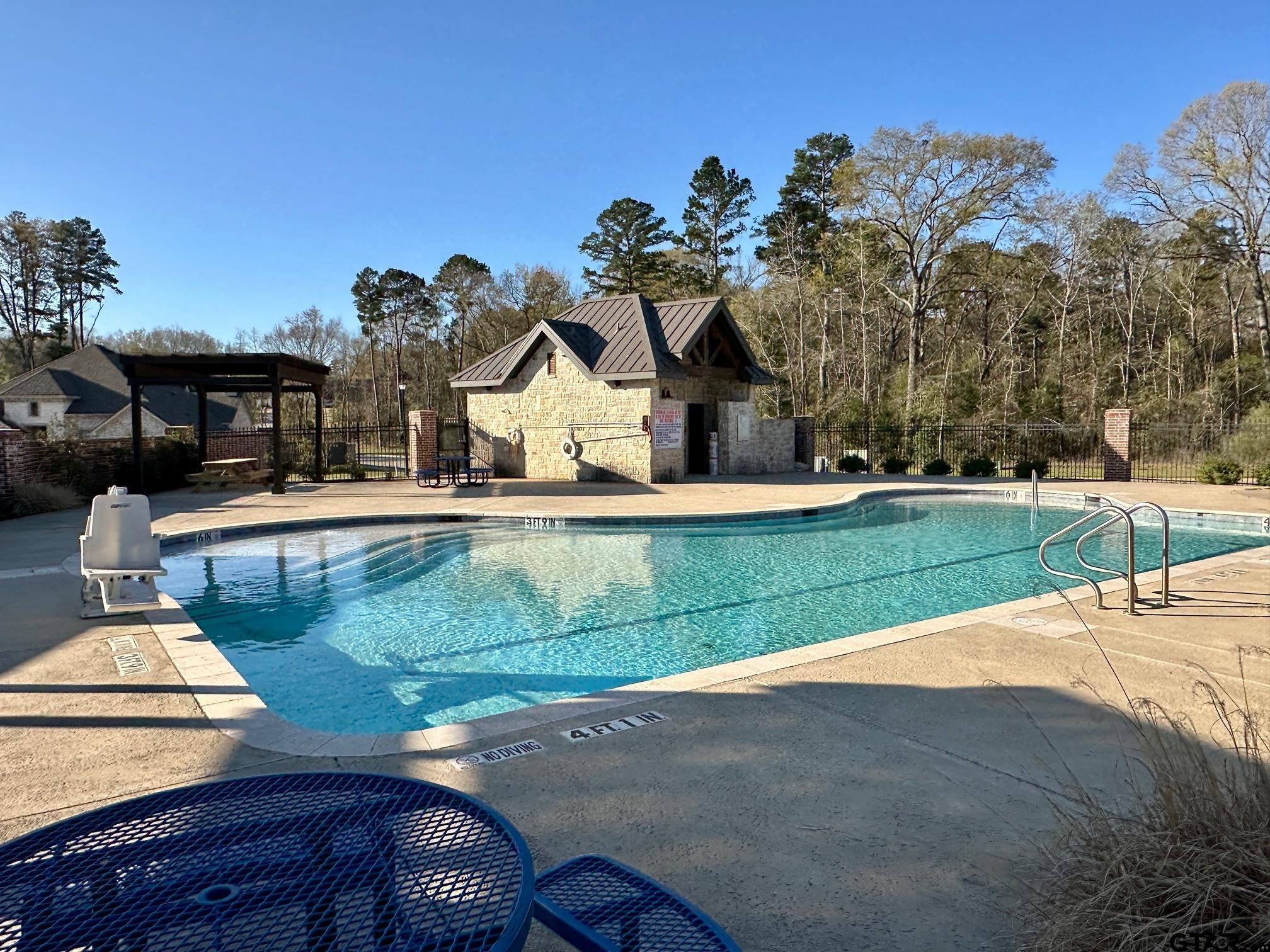 9291 Caddo Rdg Cove Tyler, TX 75703 - Photo 8 of 13 a front view of a house with a yard