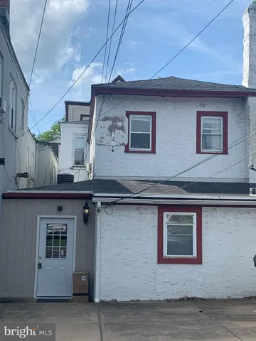a front view of a house with a garage