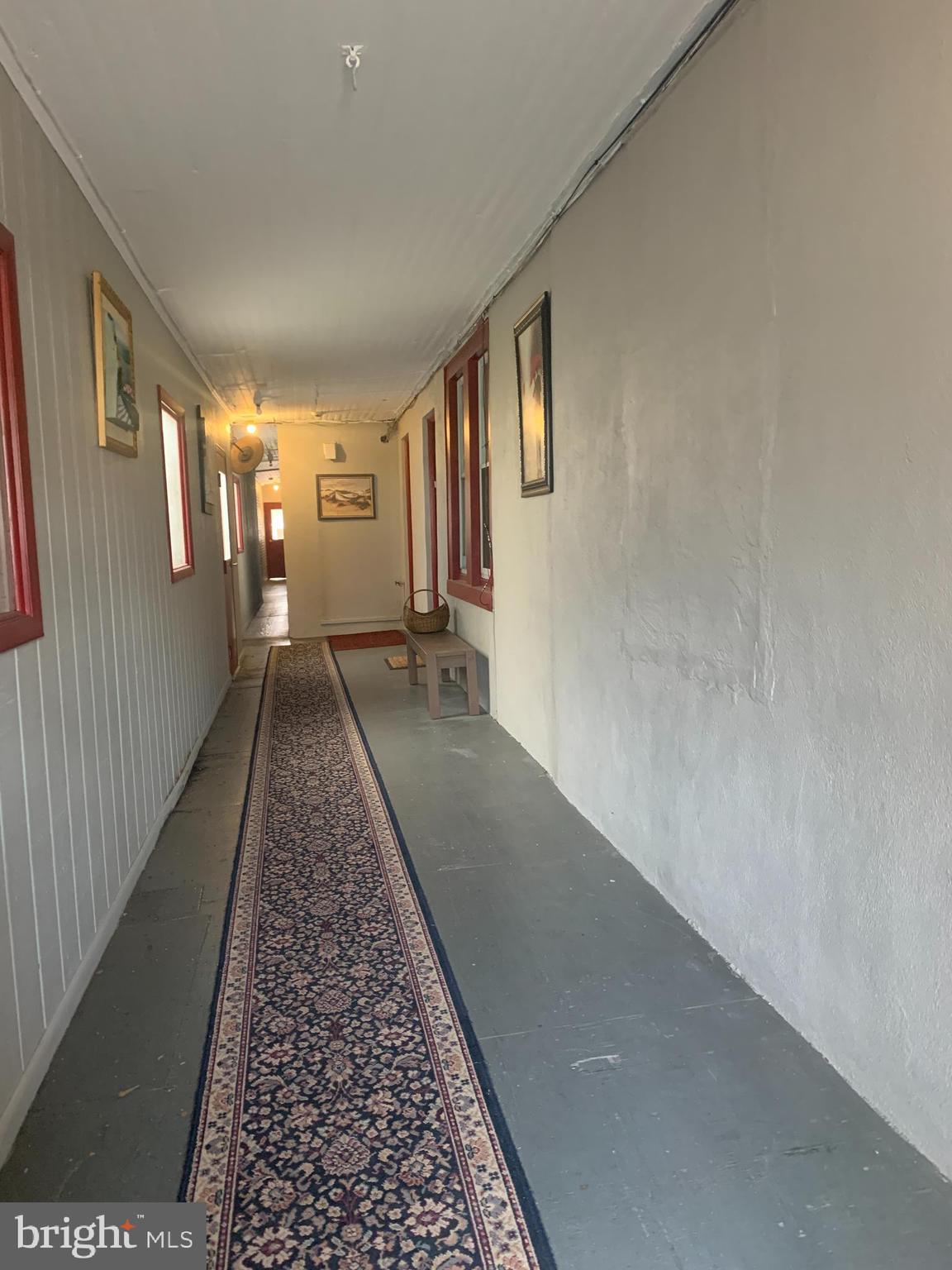 340 Main Street, Unit FIRST Royersford, PA 19468 - Photo 2 of 10 a view of a hallway with windows