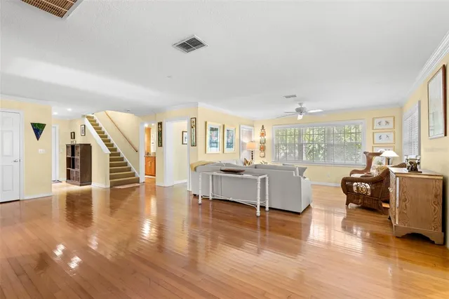 a kitchen with stainless steel appliances a sink and cabinets