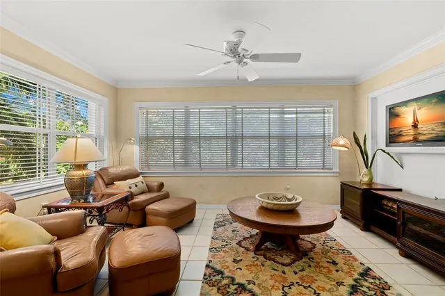 a large kitchen with granite countertop a large window