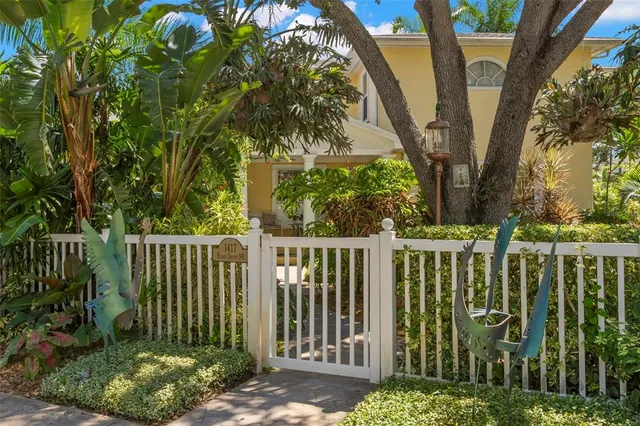 an aerial view of a house with a garden
