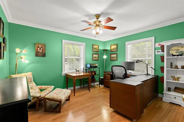 a kitchen with granite countertop a stove a sink and a microwave