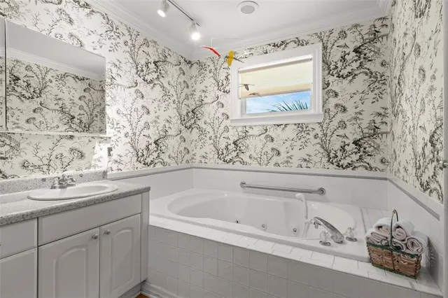 a bathroom with a bathtub and shower