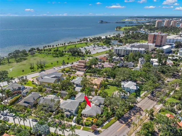 a living room with fireplace furniture and hard wood flooring