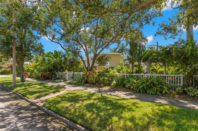 an aerial view of a house with a garden