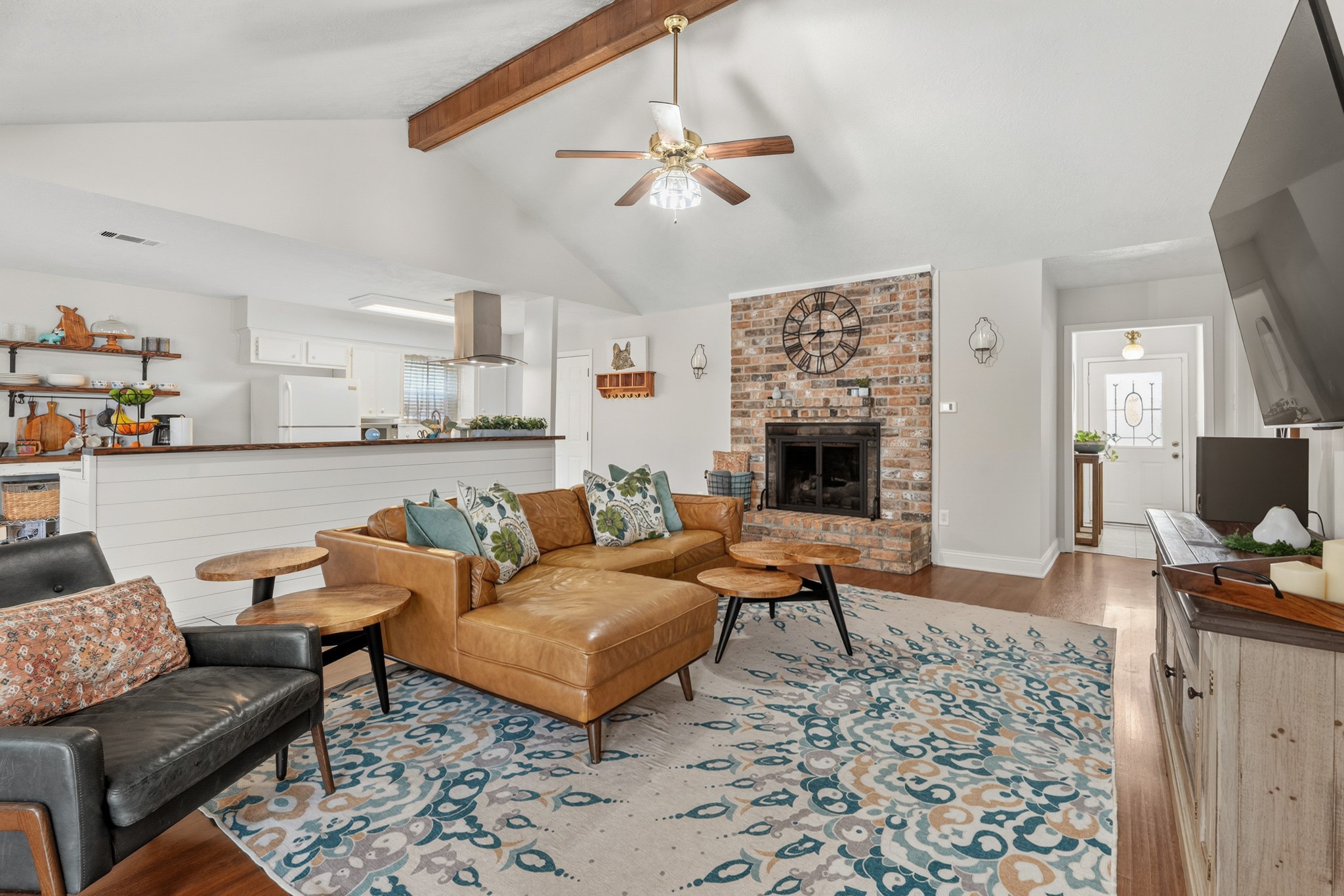 2104 Rose Road Pearland, TX 77581 - Photo 12 of 43 a living room with furniture and a fireplace