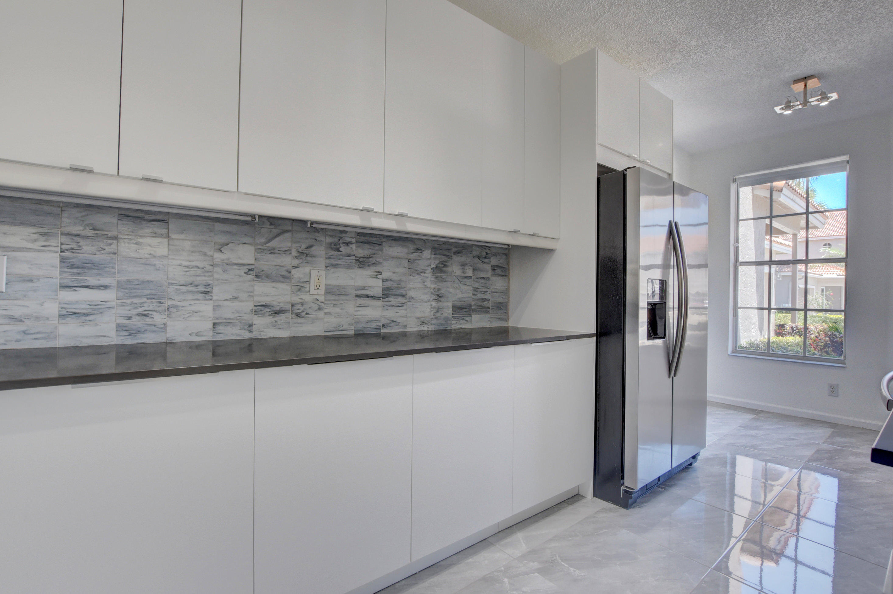 20931 Vía Azalea, Unit 2 Boca Raton, FL 33428 - Photo 7 of 28 Kitchen
