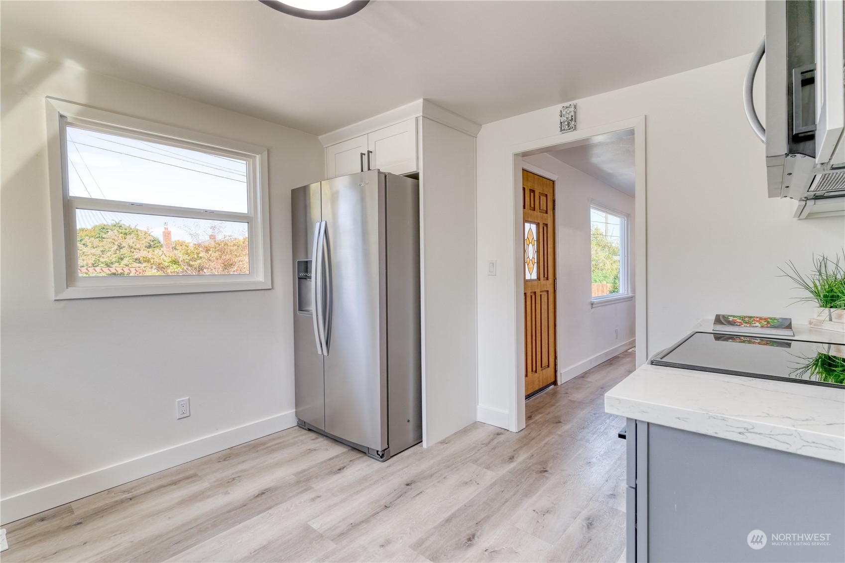 3749 Southwest Monroe Street Seattle, WA 98126 - Photo 16 of 25 a view of a kitchen with a sink and a window