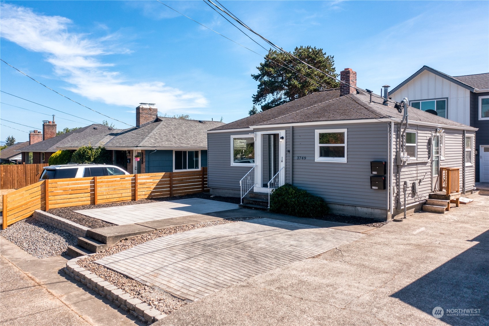 3749 Southwest Monroe Street Seattle, WA 98126 - Photo 20 of 25 a view of a house with backyard and porch