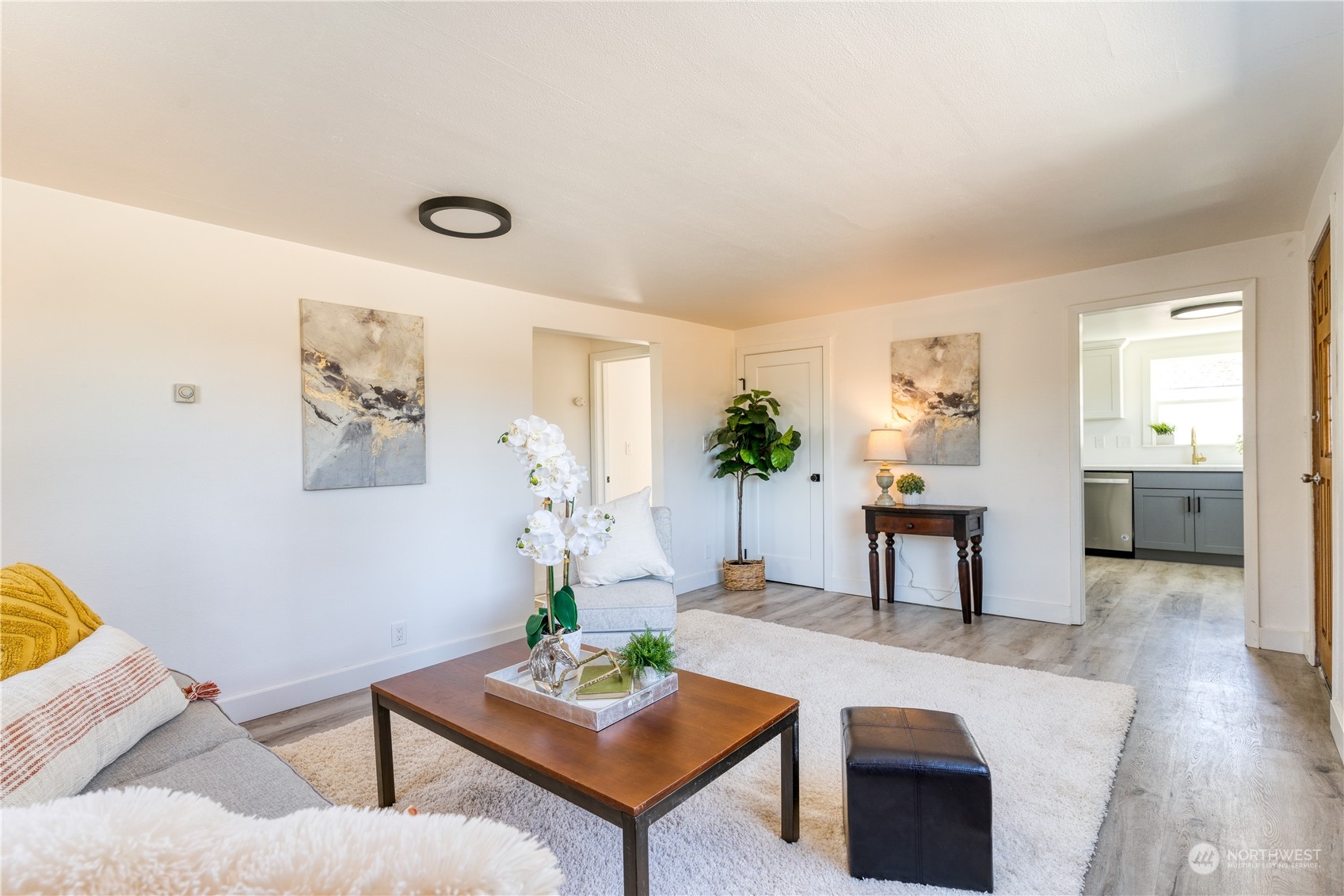 3749 Southwest Monroe Street Seattle, WA 98126 - Photo 5 of 25 a living room with furniture and wooden floor