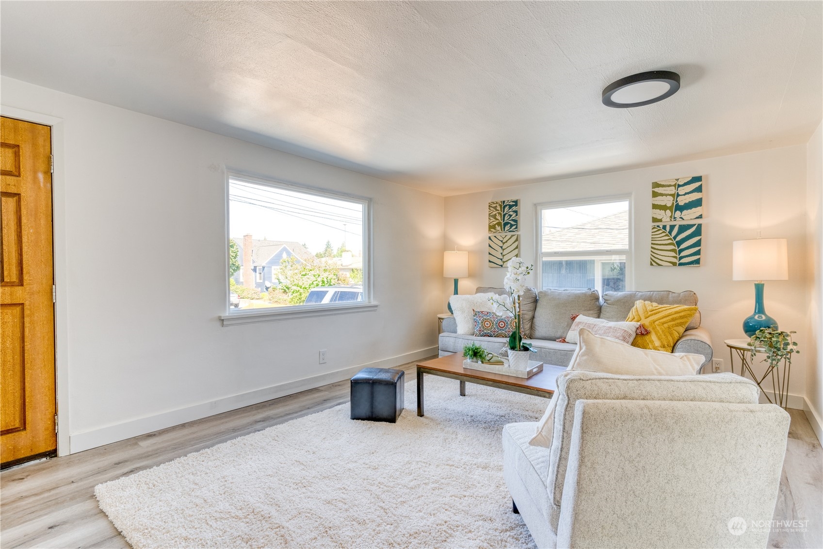 3749 Southwest Monroe Street Seattle, WA 98126 - Photo 6 of 25 a living room with furniture and a window
