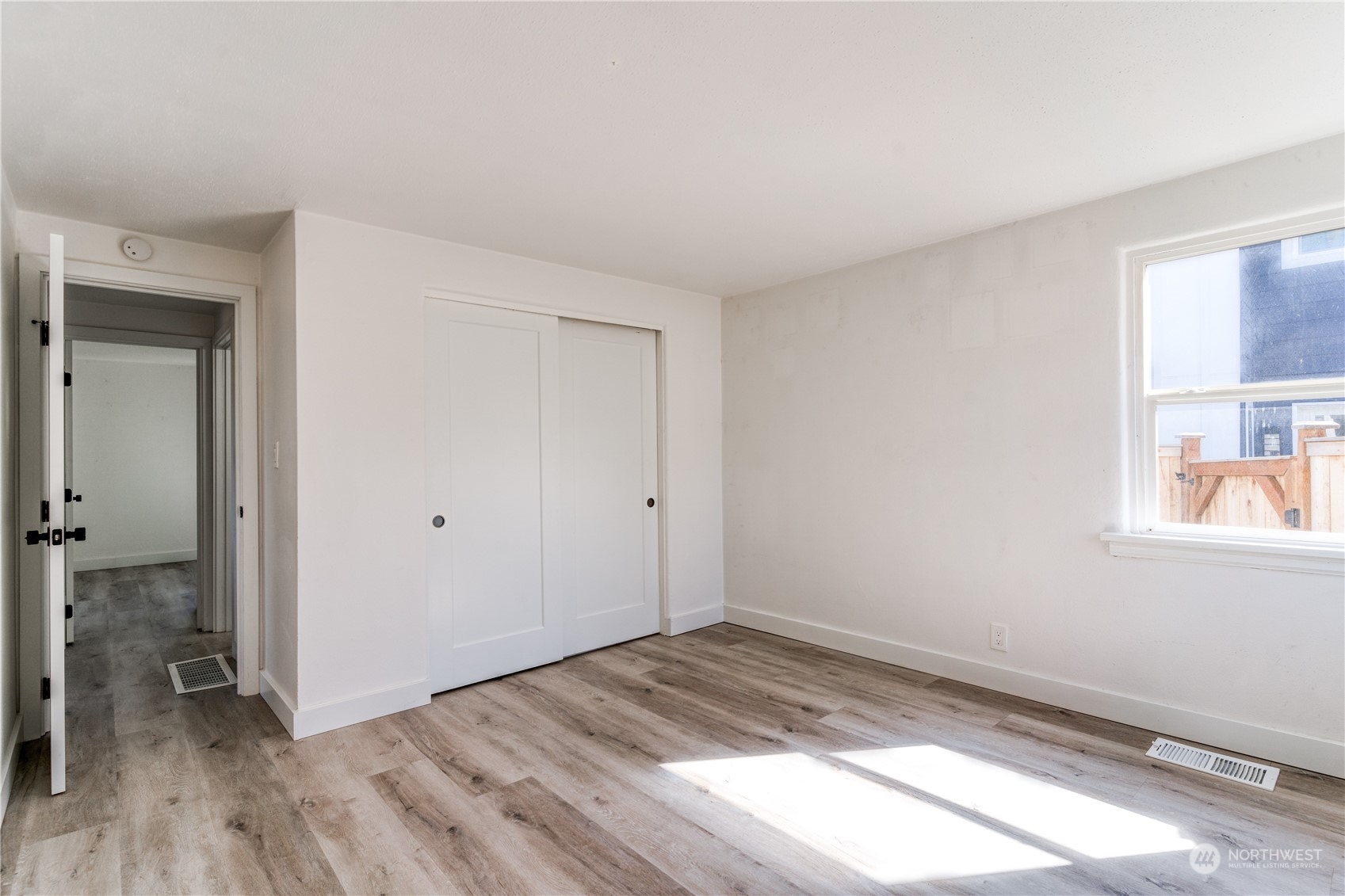 3749 Southwest Monroe Street Seattle, WA 98126 - Photo 10 of 25 a view of a room that has a bed