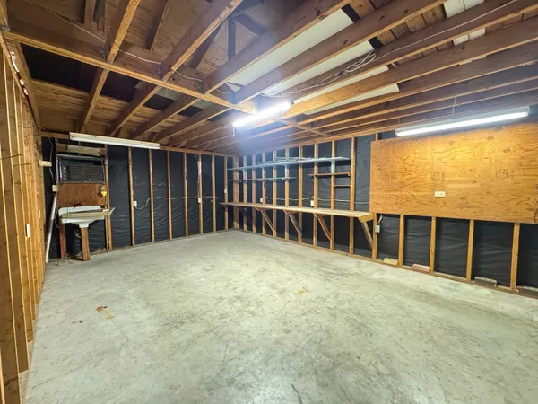 a view of an empty room with a balcony