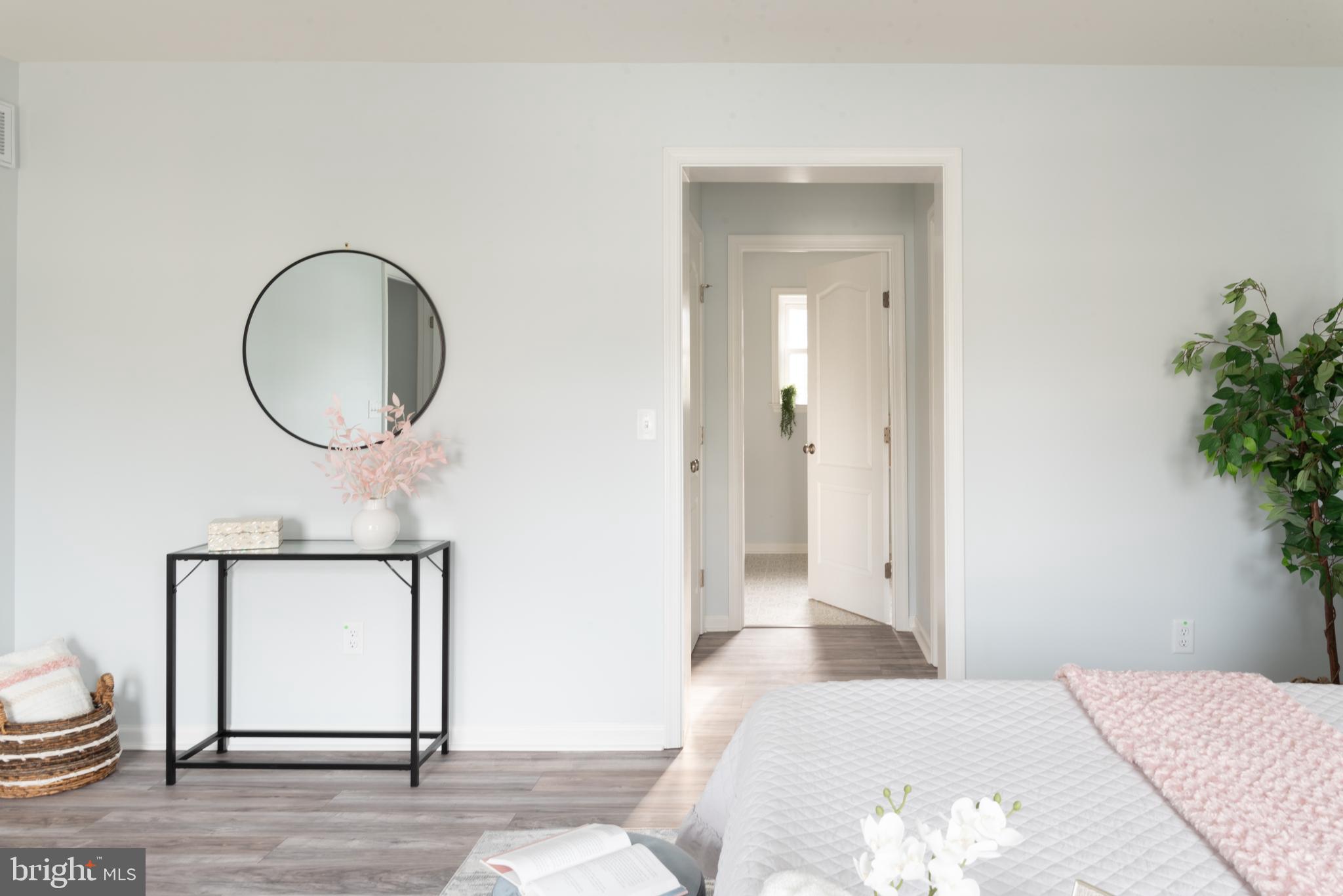 825 Selby Boulevard Edgewater, MD 21037 - Photo 18 of 55 1st foor Primary Bed view of full bath & Closets