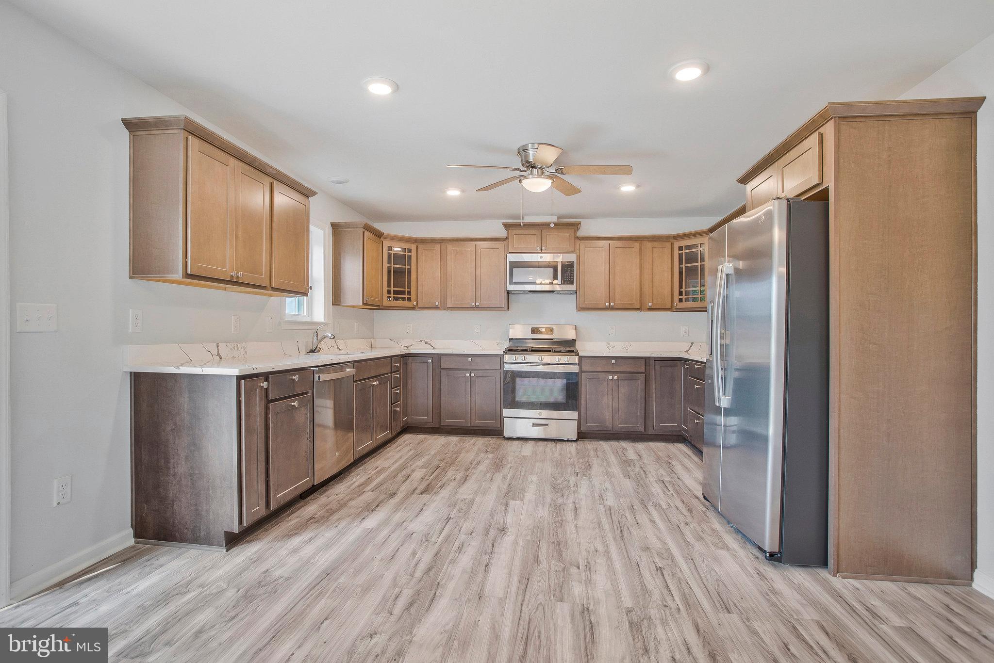 825 Selby Boulevard Edgewater, MD 21037 - Photo 37 of 55 View of kitchen with SS appliances and Granite top