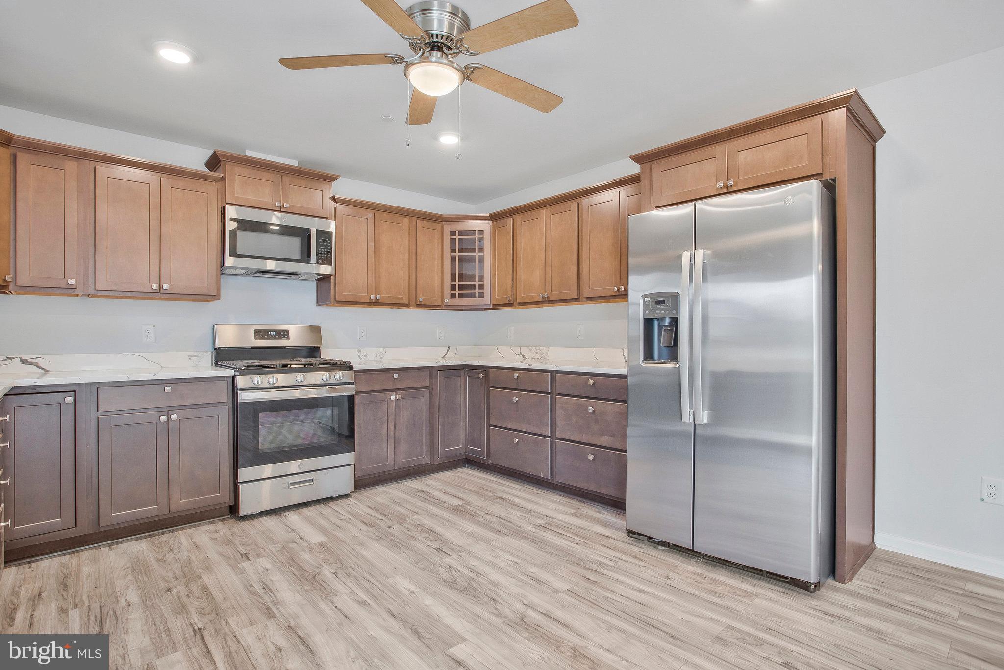 825 Selby Boulevard Edgewater, MD 21037 - Photo 38 of 55 View of kitchen with SS appliances and Granite top