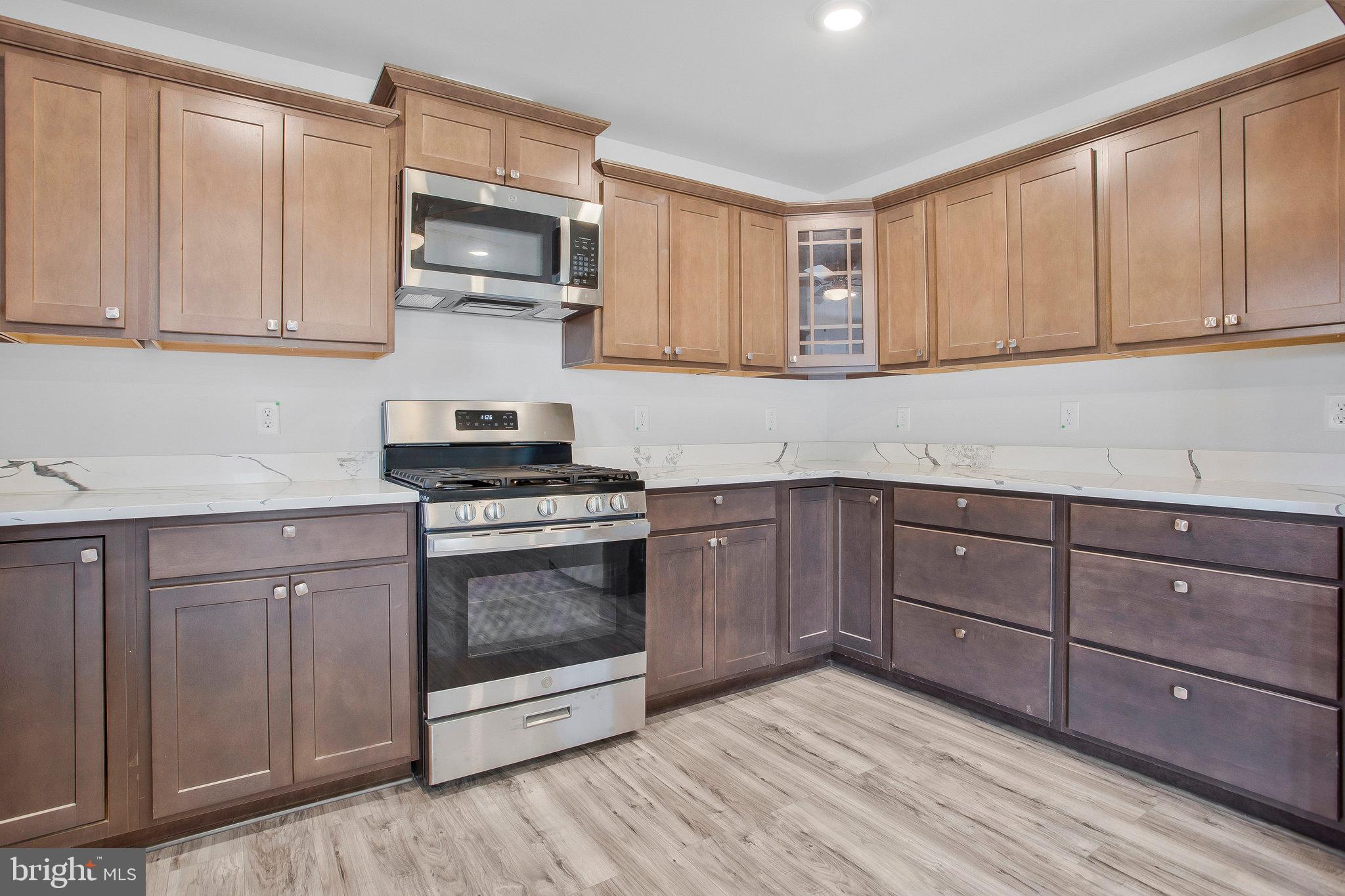 825 Selby Boulevard Edgewater, MD 21037 - Photo 39 of 55 View of kitchen with SS appliances and Granite top
