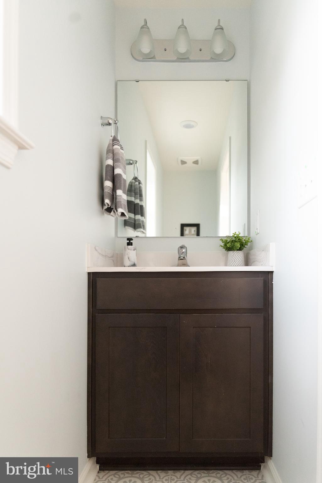 825 Selby Boulevard Edgewater, MD 21037 - Photo 10 of 55 1st floor half bath