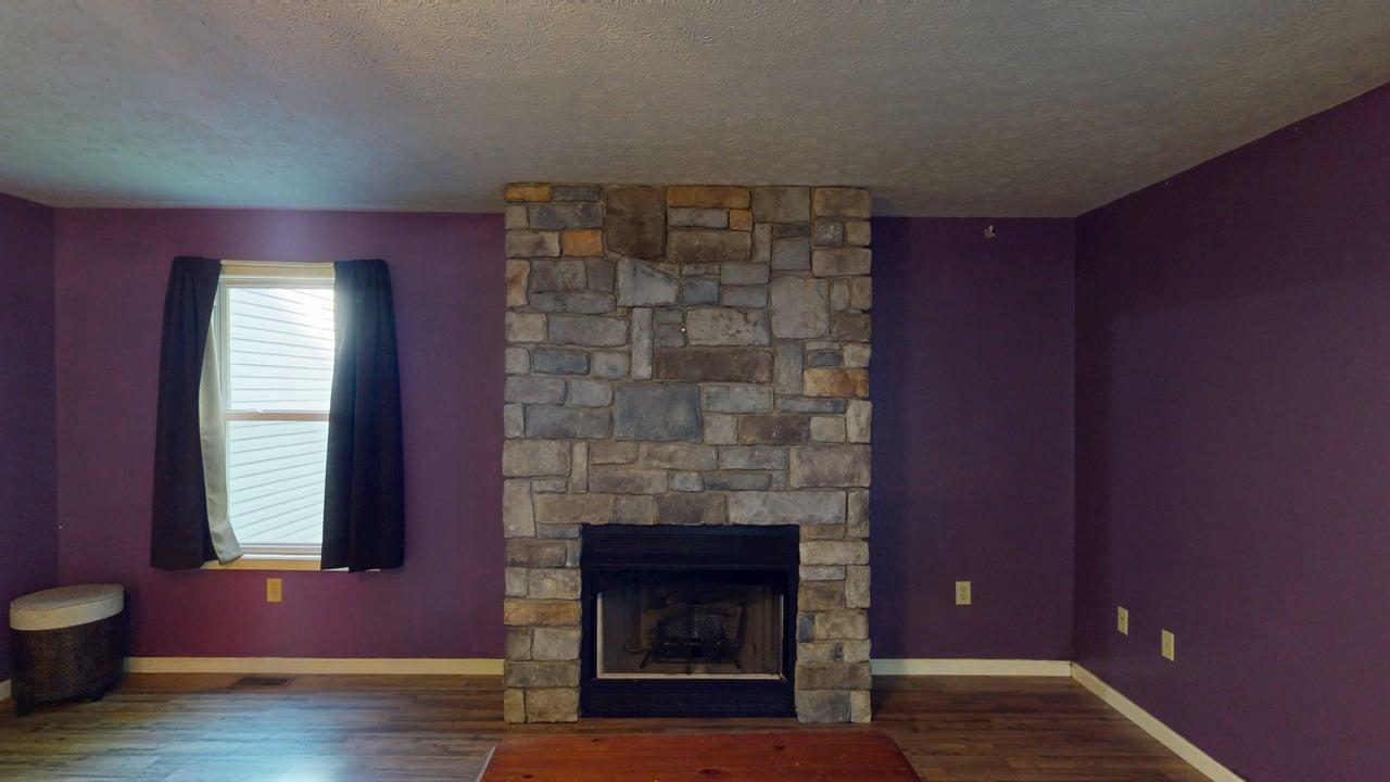 575 North River Highlands Road Delray, WV 26714 - Photo 16 of 48 Stay cozy by the propane fireplace.