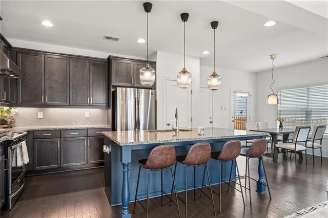 a bathroom with a sink and a window