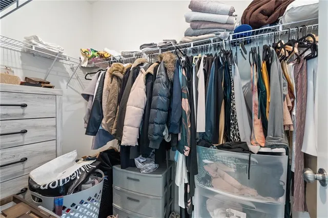 a bathroom with a sink toilet vanity and shower