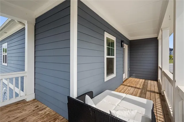 a view of a terrace with sitting area