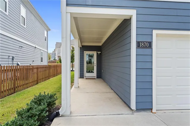 a view of a swimming pool with outdoor seating