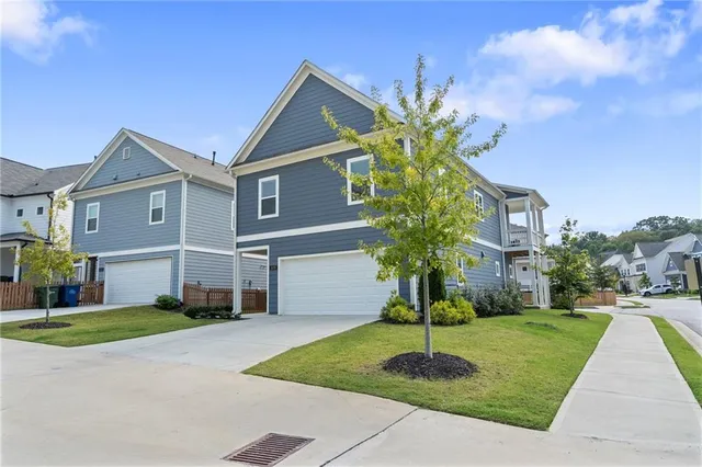 a view of a swimming pool with an outdoor space and seating area