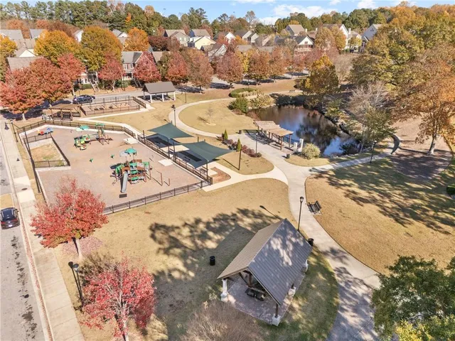 a view of a swimming pool with a chairs