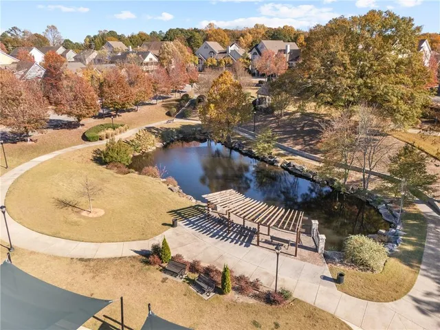 a view of a swimming pool and lake