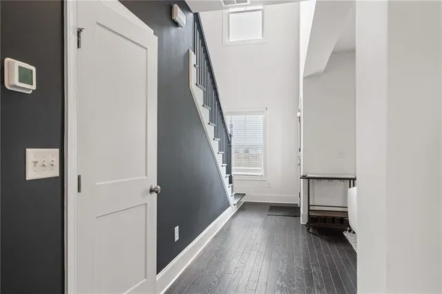 a living room with fireplace furniture and a flat screen tv