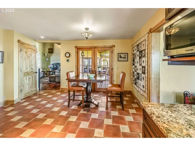 a bathroom with a sink a mirror and a shower