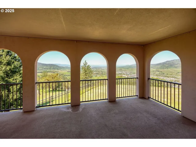 a view of a livingroom with furniture and windows