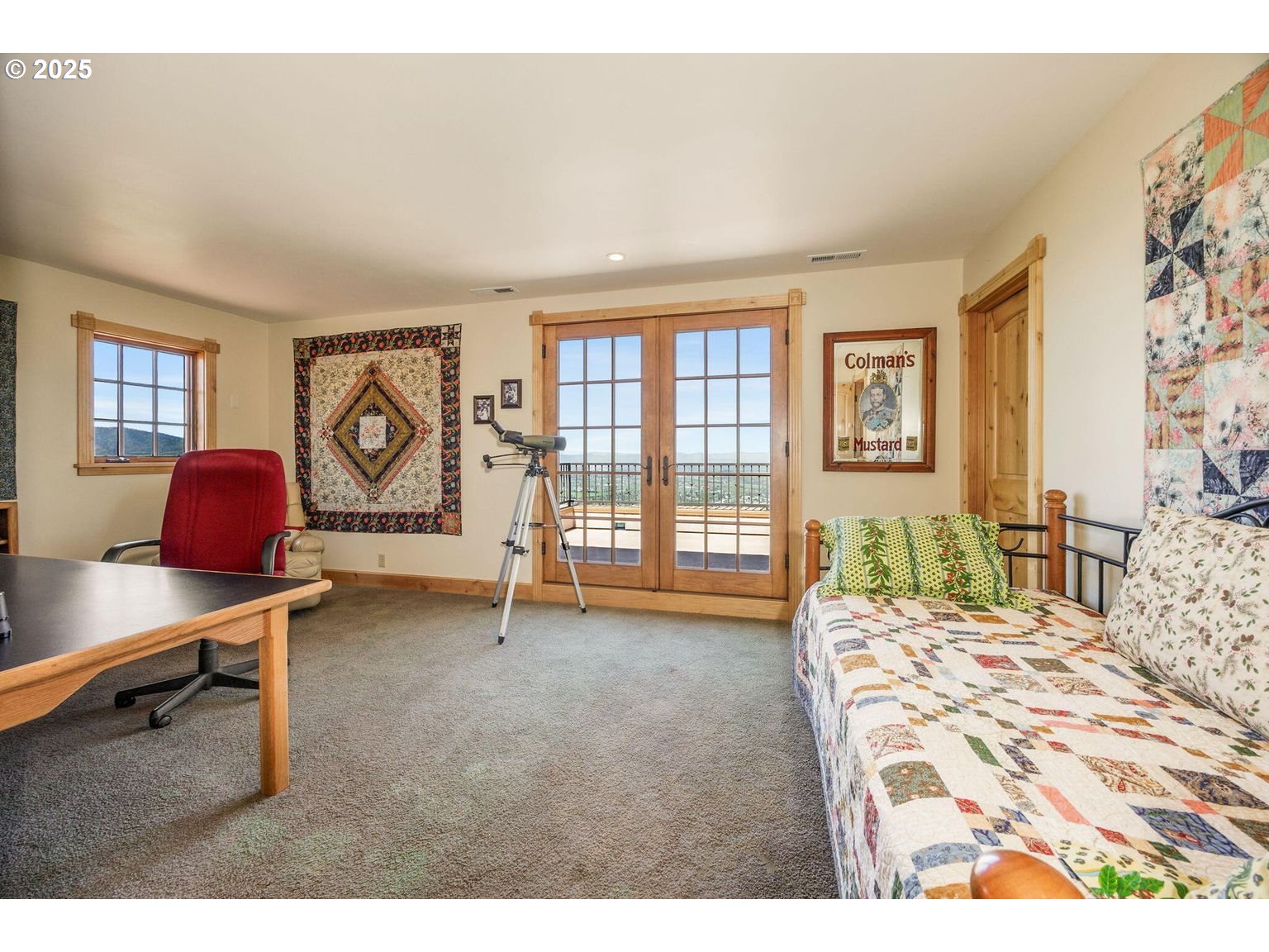 2816 Quail Run Road Talent, OR 97540 - Photo 29 of 43 a bedroom with furniture and a window