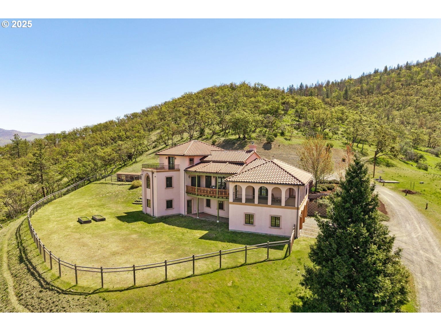 2816 Quail Run Road Talent, OR 97540 - Photo 4 of 43 a view of a house with a big yard and large trees