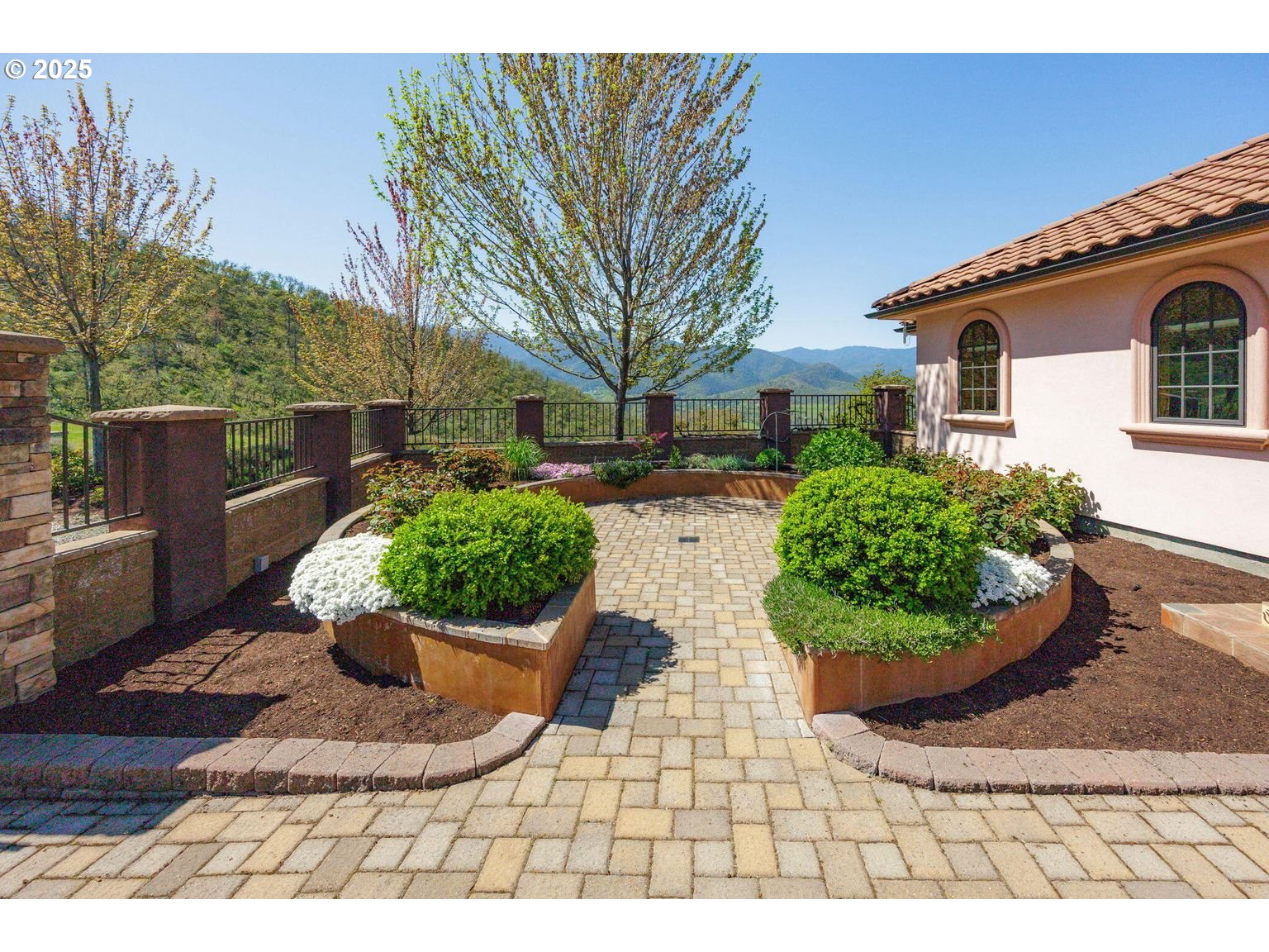 2816 Quail Run Road Talent, OR 97540 - Photo 7 of 43 a view of a backyard with plants and a patio