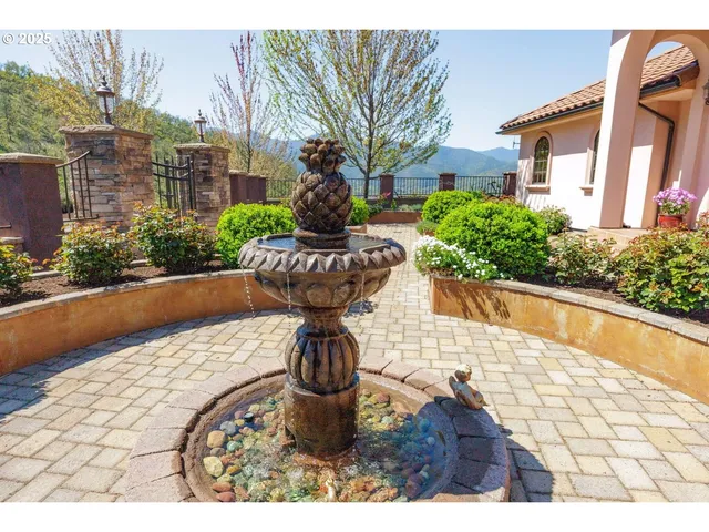 a roof deck with a table and chairs